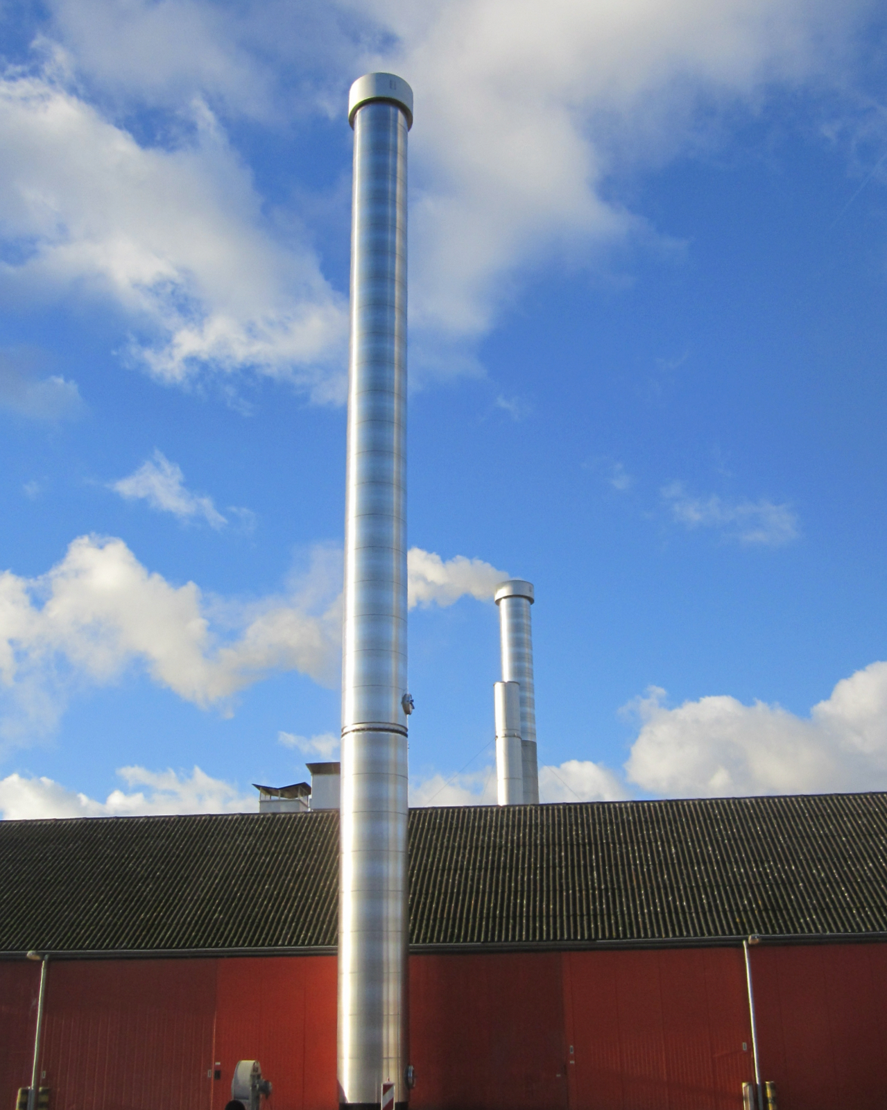 Nieuwe Oerlemans schoorsteen bouwen, bestaande verlengen